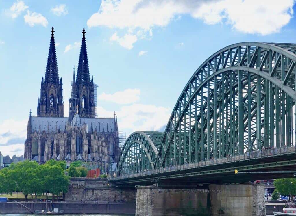 A picture of the Cologne Cathedral as seen from the other side of the Rhine River in Germany.