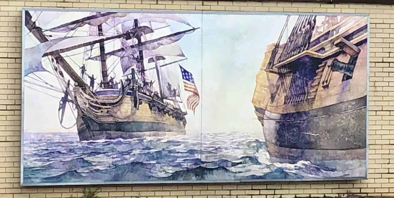 A mural shows the ship commanded by John Paul Jones in battle.