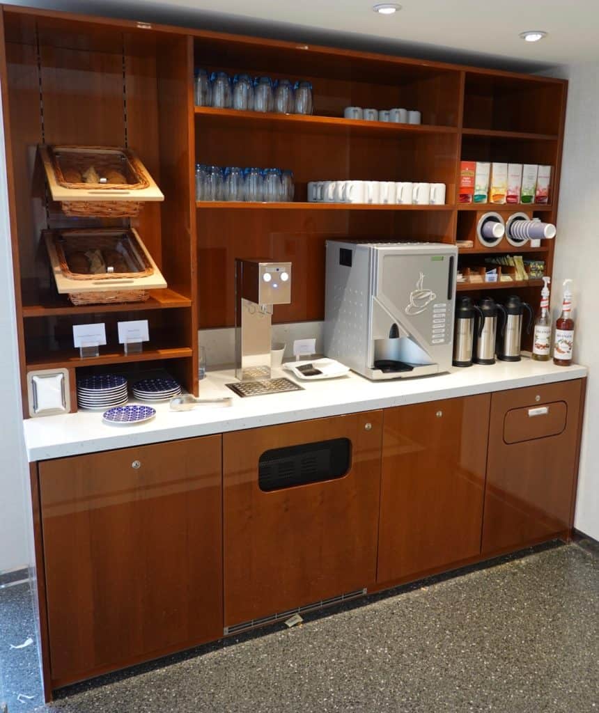 A beverage station has coffee,, tea, and pastries aboard a Viking river cruise ship.