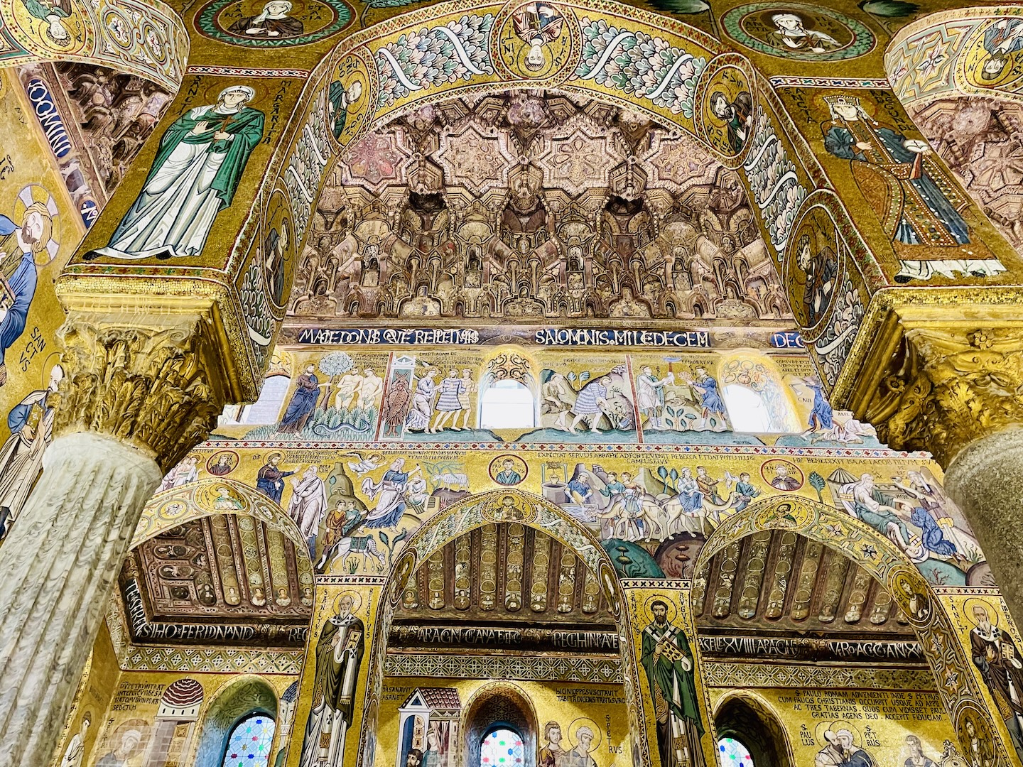 The elaborate gold and colorful mosaics adorn an alter at the Palatine Chapel in the Palazzo del Normanni in Palermo, Sicily.