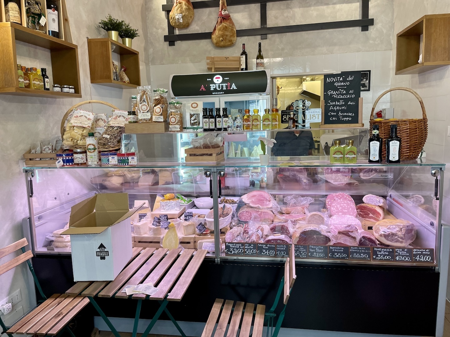 A neighborhood shop in Palermo sells the makings for charcuterie and wine. 