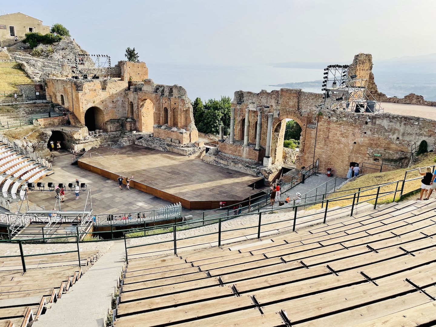 The ancient Greek theater in Taormina, Sicily offers a commanding view of the sea.